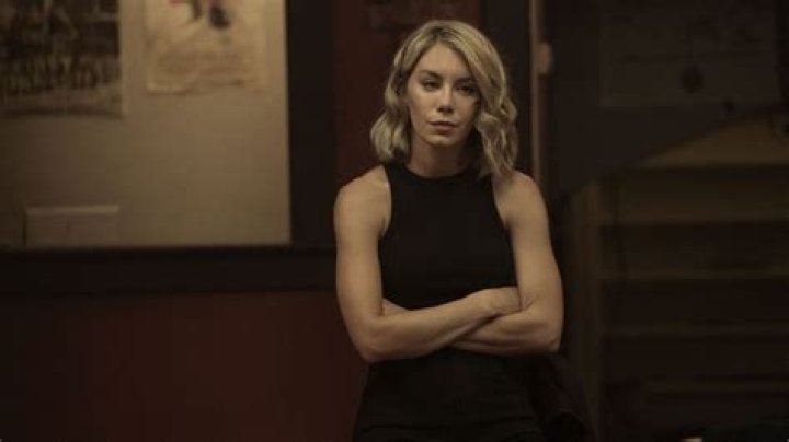 Jennifer Holland as E. Harcourt in 'The Suicide Squad'