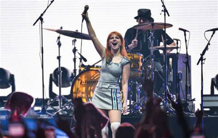 Paramore full-time and touring musicians (from left to right: Taylor York, Joey Howard, Hayley Williams, Zac Farro, Joey Mullen, Brian Robert Jones, and Logan MacKenzie) on Halloween 2022.